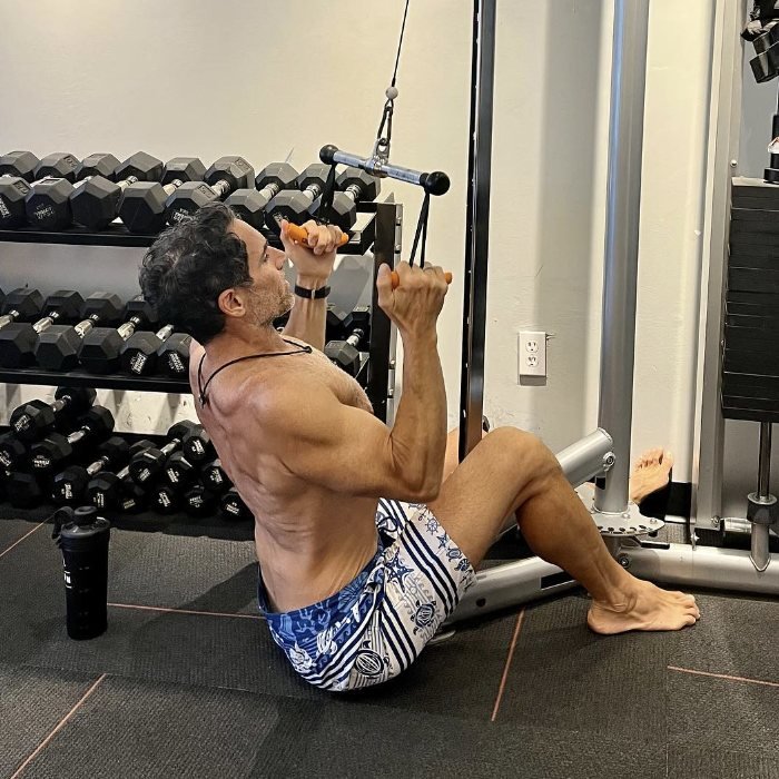 Franco Zuccoli training on a cable machine